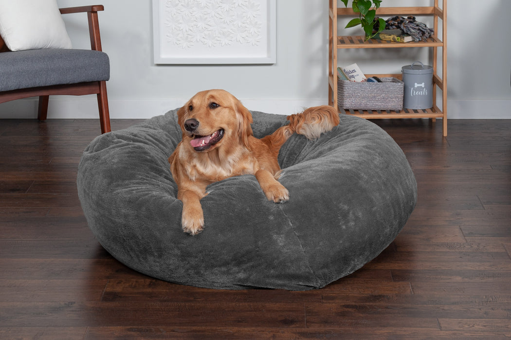 A Bean Bag Bed With Built-in Blanket and Pillow