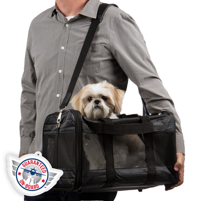 https://furhaven.com/cdn/shop/products/55231_Sherpa_Deluxe_Pet_Carrier_MD_Black_In_Use2_Square-gob3_700x700.jpg?v=1679333600